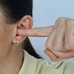 Step-by-step guide on wearing regular earrings with gauged ears