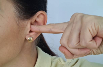 Step-by-step guide on wearing regular earrings with gauged ears