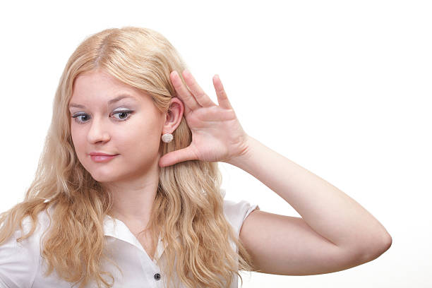 Fashionable woman demonstrating how to wear hypoallergenic fake earrings
